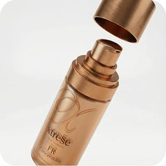Open cap on Xtresse FR Concentrate hair serum bottle