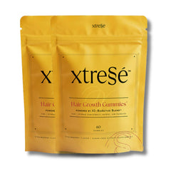 Two pack bundle of Xtressé strawberry hair growth gummies pouches