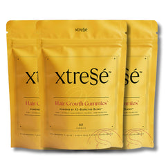Three pack bundle of Xtressé strawberry hair growth gummies pouches